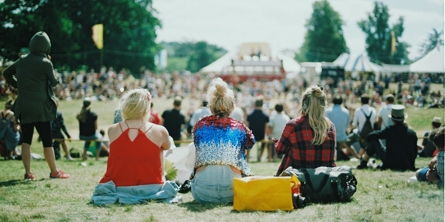 group of people on grass field under sunny day